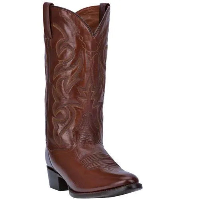 Brown cowboy boot with intricate embossing on a white background