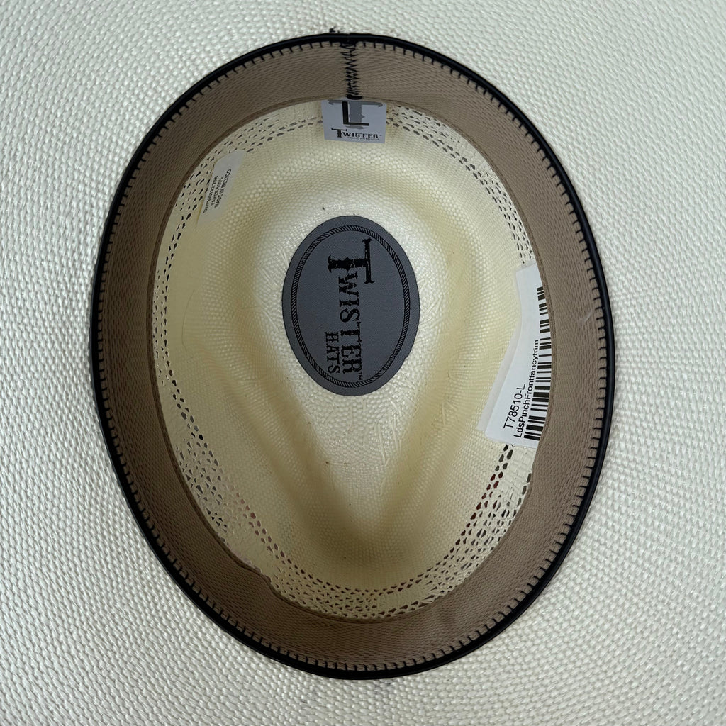 Close-up of a cowboy hat with a brand label on a white background