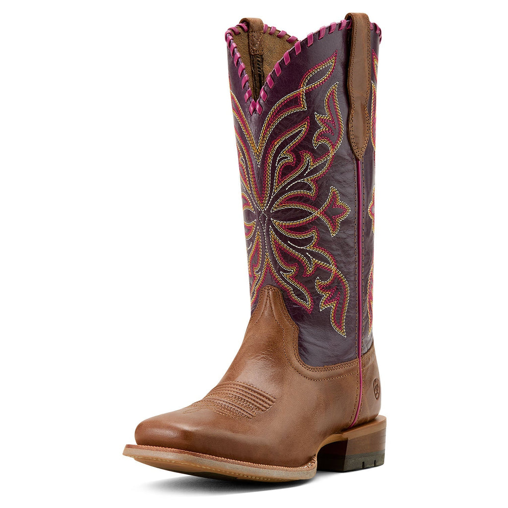 Brown cowboy boot with intricate purple and red embroidery on a white background