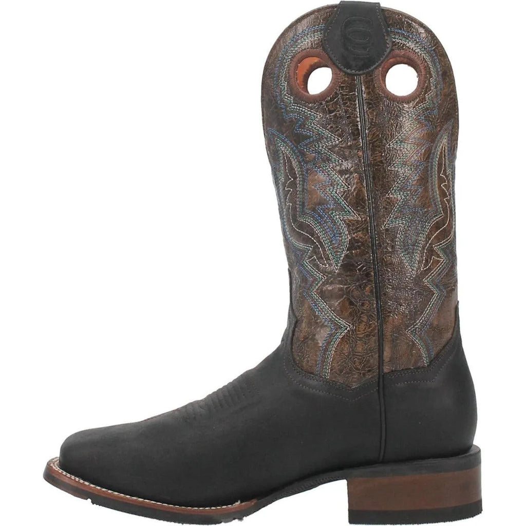 Black and brown cowboy boot with intricate pattern on a white background